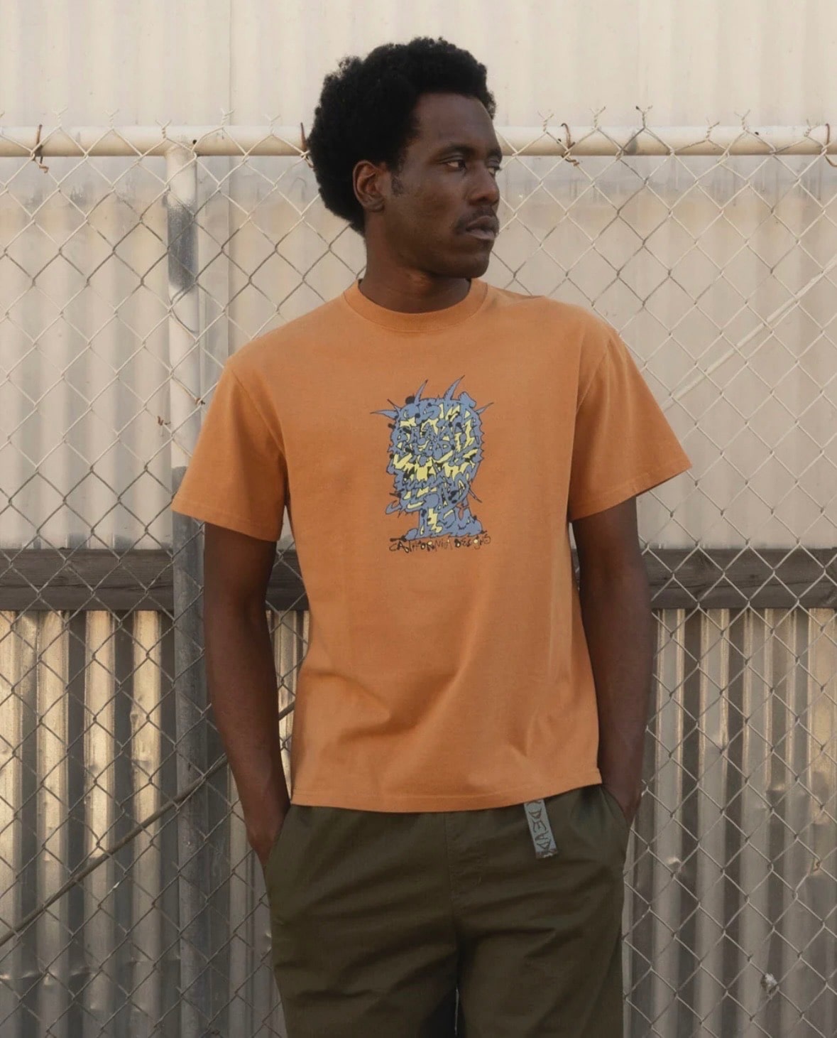 BRAIN DEAD/ブレインデッド/SCRAMBLED HEAD T-SHIRT - CUMIN CAMEL M